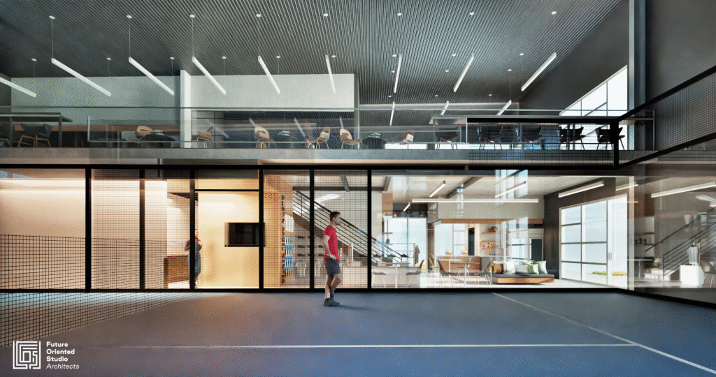 Indoor padel court at Austin Paddle Center with mezzanine lounge and glass walls.